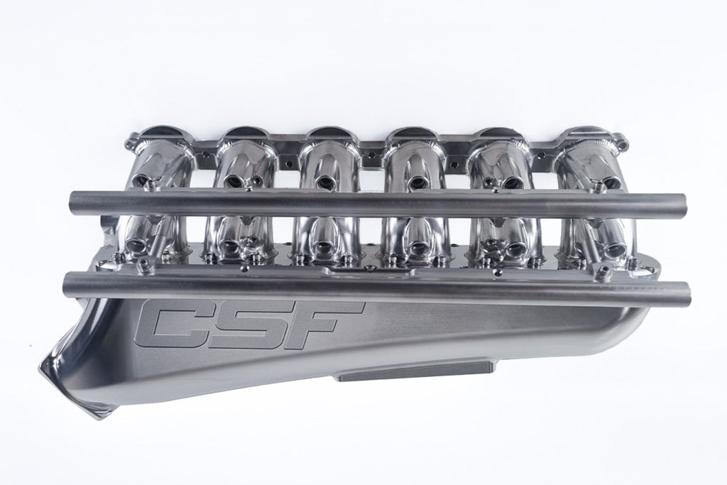 CSF G8X M2, M3, M4 S58 billet air-to-air competition manifold on white background, showcasing polished performance automotive part.