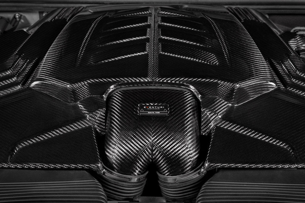 Eventuri 4.0TFSI Twin Turbo V8 black carbon intake system showing sleek air intake components for high-performance engines.