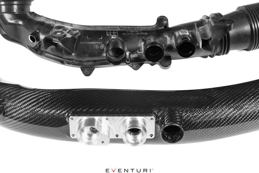 Eventuri black carbon turbo tube for Mercedes AMG A35 and CLA35, performance upgrade part on a white background.