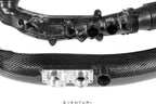 Eventuri black carbon turbo tube for Mercedes AMG A35 and CLA35, performance upgrade part on a white background.