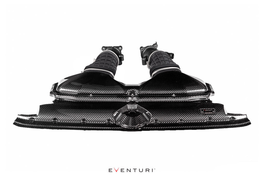 Eventuri black carbon intake system for Audi C8 RS6 and RS7, showcasing sleek performance design on a glossy white background.