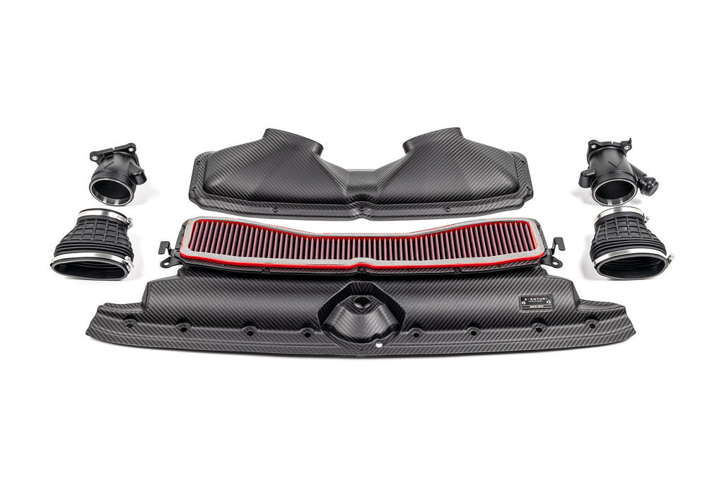 Eventuri black carbon intake system for Audi C8 RS6 and RS7, performance air intake with sleek matte finish on a white background.