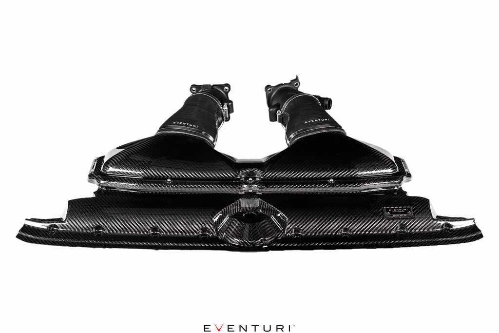 Eventuri Audi C8 RS6 RS7 black carbon intake system, highlighted with gloss finish, showing detailed design on a white background.