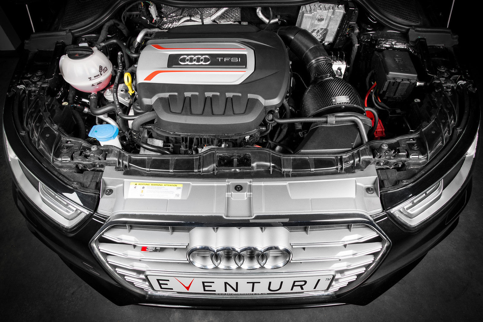 Eventuri Audi 8X S1 carbon intake system with air filter installed, showcasing sleek design from overhead view.