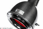 Close-up of Eventuri Audi 8X S1 Carbon Intake System with venturi housing, showcasing sleek carbon fiber design and performance components.