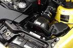 Eventuri carbon fiber intake installed in the engine bay of a BMW E46 M3