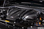 Eventuri black carbon intake system installed in BMW F95 X5M engine bay, showcasing performance air intake for F9X X5M, X6M, G09 XM, M60i models.