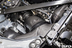 Eventuri black carbon intake system for BMW G8X M2, M3, M4 S58 engine installed in engine bay, V2 performance upgrade.
