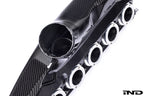 lose-up view of Eventuri BMW S85 carbon intake plenum inlet port showing internal opening and carbon fiber construction