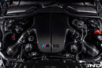 Eventuri S85 carbon plenum system installed in BMW V10 engine bay showing carbon intake plenum and optional intake