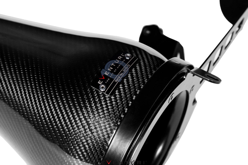 Eventuri black carbon intake system for BMW F7X M135 M235 and X1 X2 M35i models on a white background