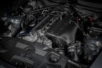 Eventuri hybrid carbon airbox system installed in engine bay of BMW Z4 M E85/E86, showcasing performance air intake upgrade.