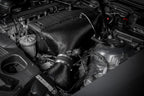 Eventuri hybrid carbon airbox system installed in BMW Z4 M engine bay, showcasing performance air intake components.