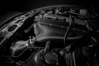 Eventuri E85/E86 Z4M hybrid carbon airbox system installed in engine bay, showcasing performance air intake components.