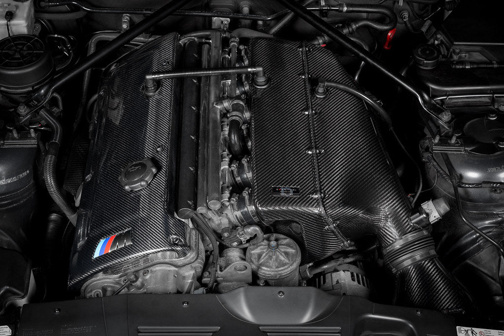 Eventuri hybrid carbon airbox system installed in BMW Z4 M engine bay, showcasing performance air intake components.