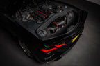 Eventuri carbon fiber intake system installed in a Chevrolet C8 Corvette Coupe with clear trunk panel