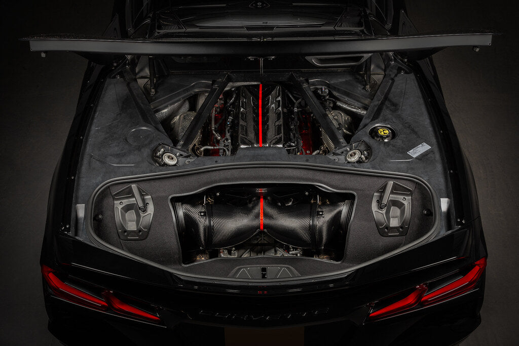 Eventuri carbon fiber intake system installed in a Chevrolet C8 Corvette Coupe with clear trunk panel