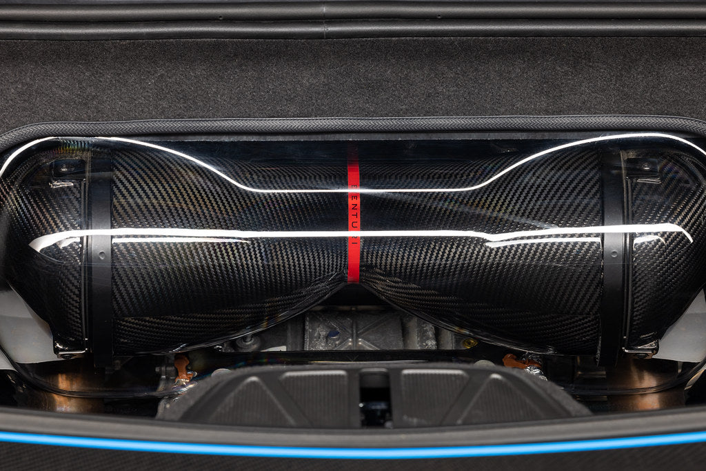 Eventuri carbon fiber intake system installed in a Chevrolet C8 Corvette Hard-Top Convertible with clear trunk panel