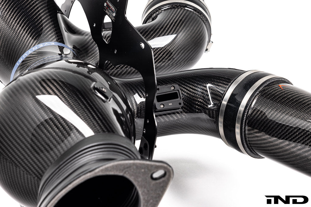 Eventuri Chevrolet Corvette C8 ZR1 hard-top convertible black carbon intake system on a white background, showcasing its sleek design.
