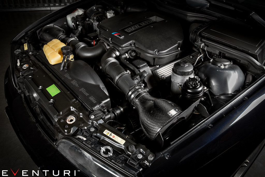 Installed side view of Eventuri BMW E39 M5 carbon intake system in engine bay