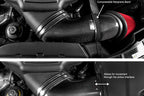 Eventuri BMW E9X M3 S65 black carbon performance intake system installed in engine bay.