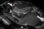Eventuri black carbon intake system installed in BMW E9X M3 S65 engine bay, showcasing performance air intake for enhanced engine airflow.