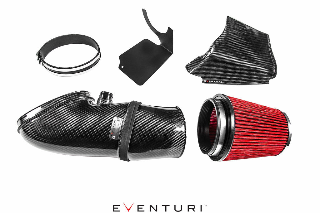 Eventuri BMW E9X M3 S65 black carbon intake system with glossy finish, showcasing the performance air intake on a white background.