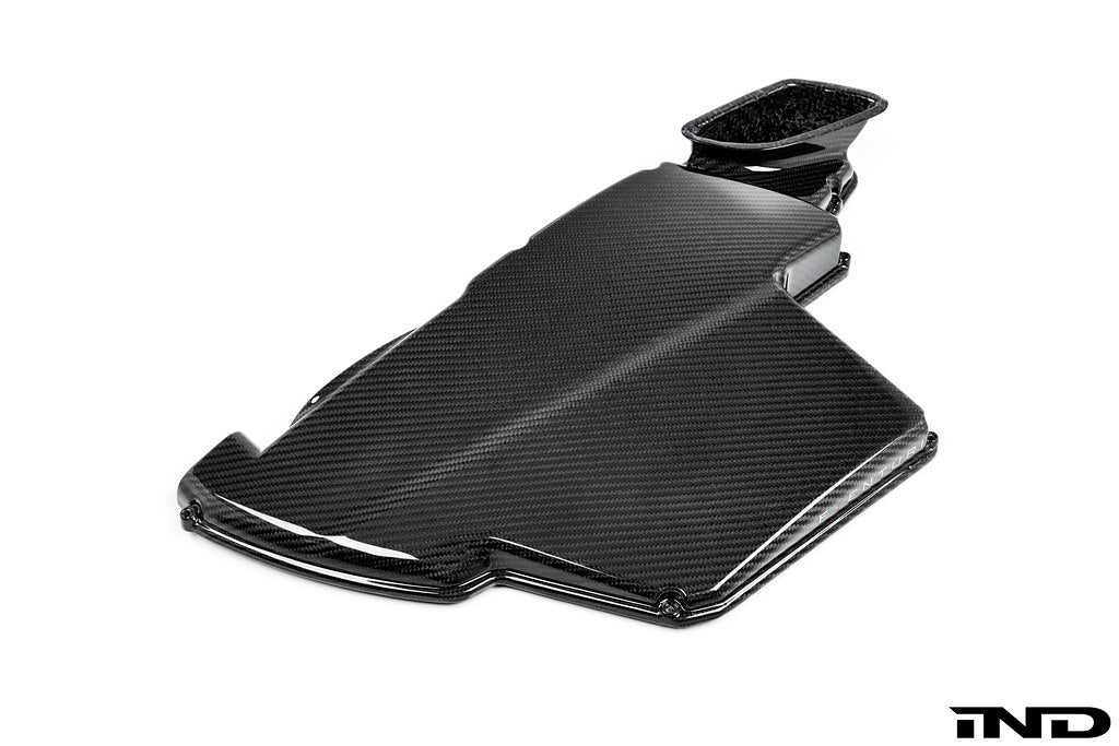Eventuri black gloss carbon airbox lid for BMW E9X M3 (S65) performance air intake system, showcasing a sleek, high-quality finish.