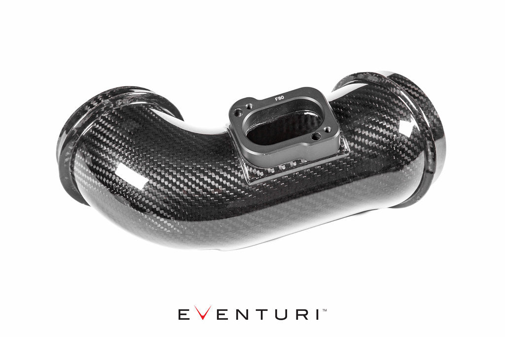 Eventuri black carbon intake system installed in a BMW F87 M2 Competition and M2 CS with white engine bay background.