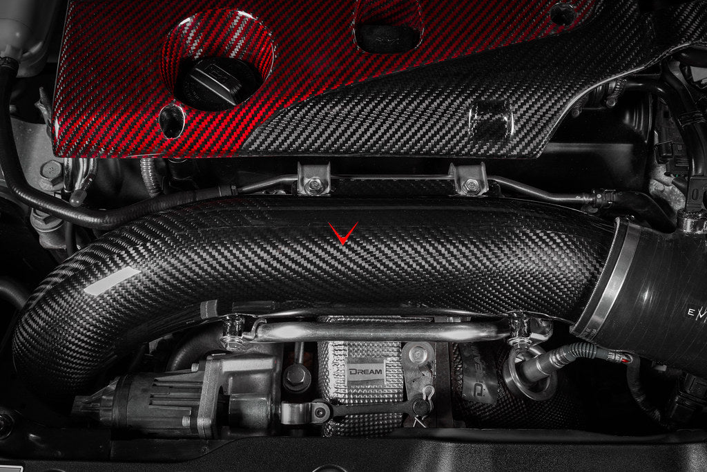 Eventuri carbon fiber charge pipe installed in the engine bay of a Honda FL5 Civic Type R