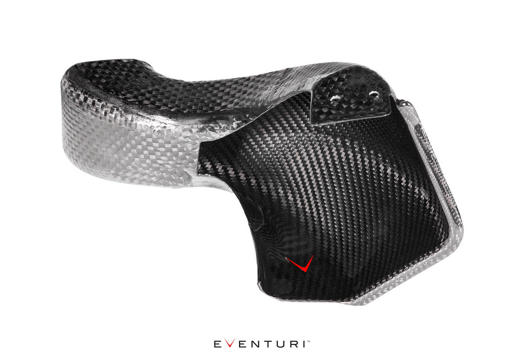 Eventuri BMW G8X M3 M4 black carbon intake scoop set, performance car accessory with glossy white finish in close-up image.