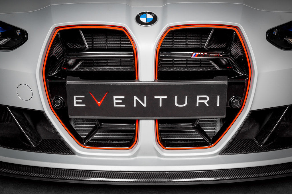 Eventuri black carbon intake scoops installed on BMW G8X M3 and M4, showcasing high-performance engine airflow components.