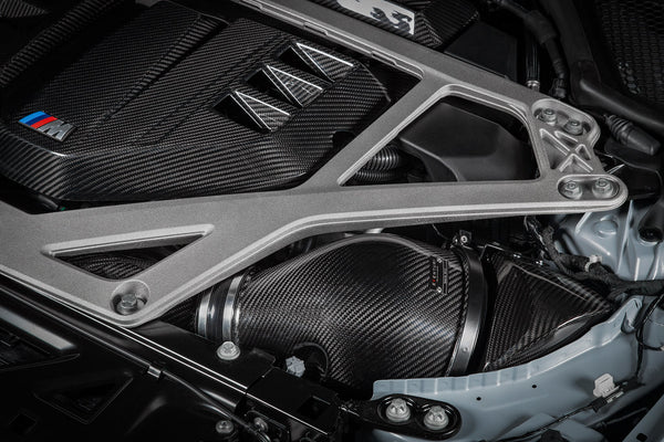 Eventuri G8X intake system in gloss and matte pre-preg carbon fiber finishes shown on a white background for BMW M2 M3 and M4 applications