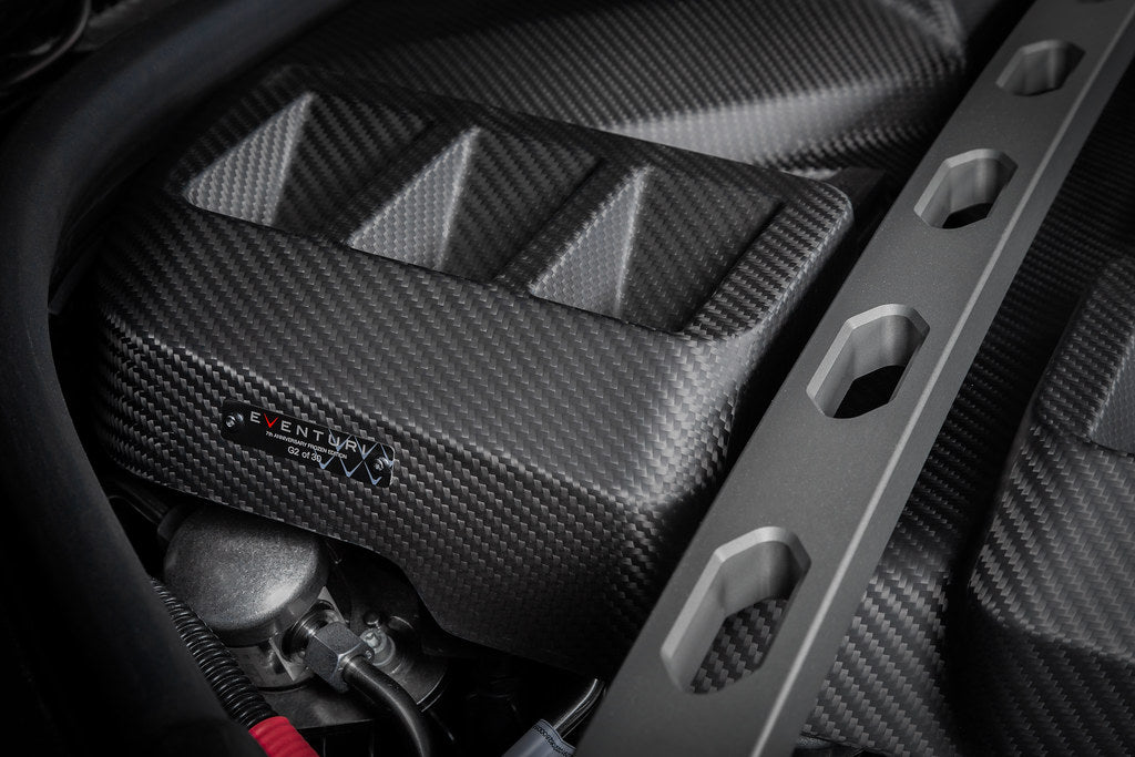 Eventuri black carbon engine cover installed in engine bay for G8X M2, M3, M4 with S58 engine, matte finish, exterior upgrade.