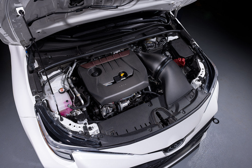 Eventuri GR Corolla carbon intake system installed in engine bay, showcasing matte finish and performance design.