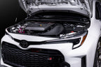 Eventuri GR Corolla carbon intake system installed in engine bay, showcasing matte finish and performance-focused design.