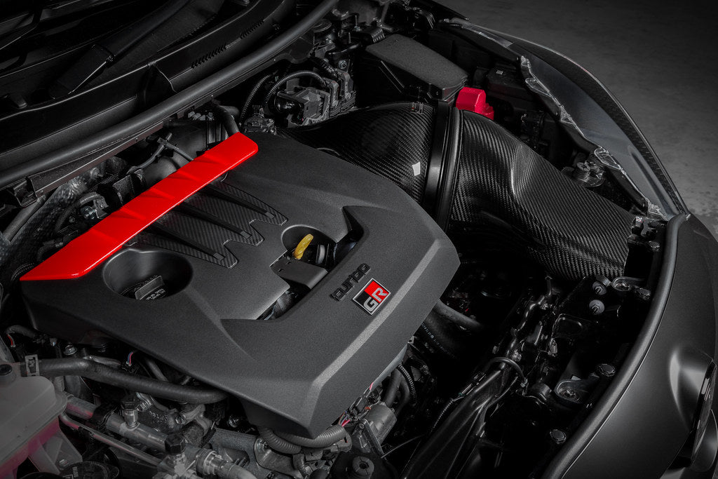 Glossy black Eventuri GR Yaris Carbon Intake System installed in a performance upgrade for the Toyota GR Yaris.