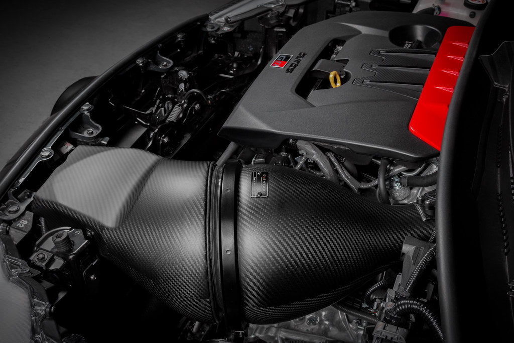 Eventuri GR Yaris carbon intake system installed, showcasing matte finish and performance design for enhanced engine airflow.