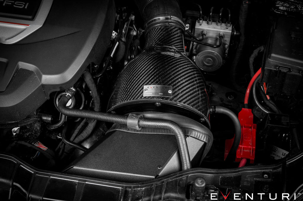 Close-up of Eventuri Audi 8X S1 Carbon Intake System installed, showcasing the performance air intake with sleek carbon fiber design.