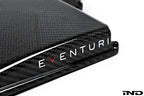 Eventuri black gloss carbon airbox lid for BMW E9X M3 (S65) performance engine, detailed close-up of the carbon finish.