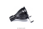 Eventuri GR Corolla carbon intake system installed on a white background, highlighting the performance-focused design and glossy finish.