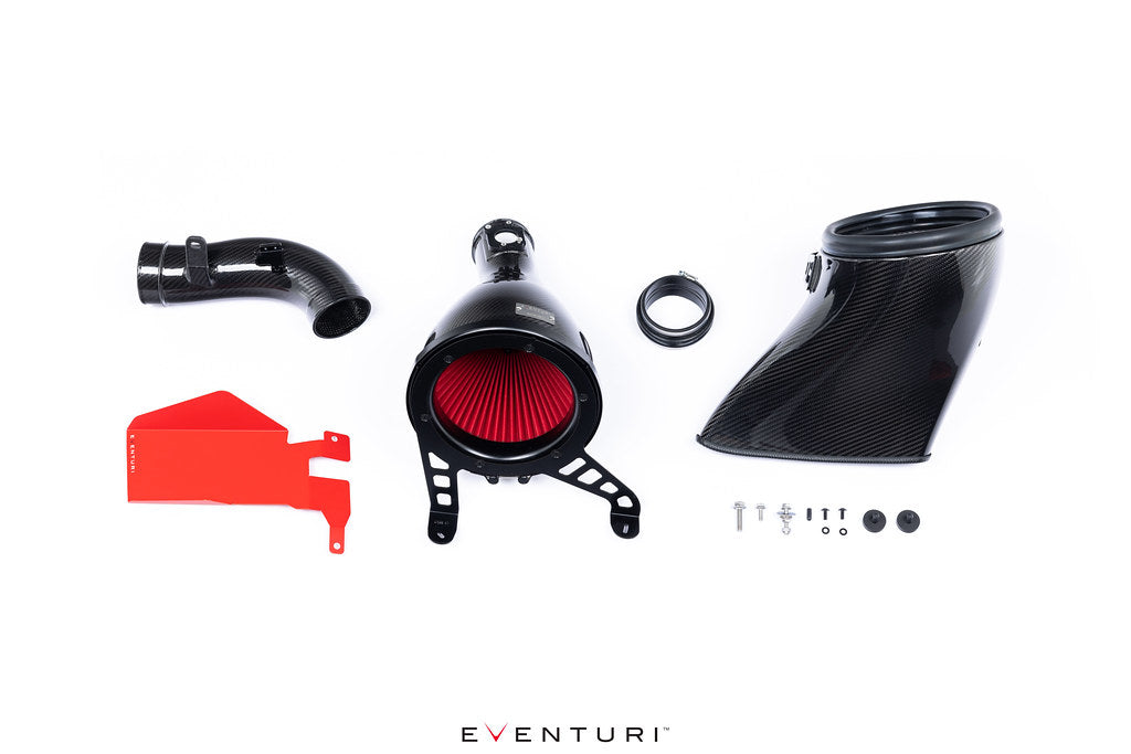 Eventuri GR Corolla Carbon Intake System, including a black carbon fiber housing, red filter, mounting hardware, and intake tube.