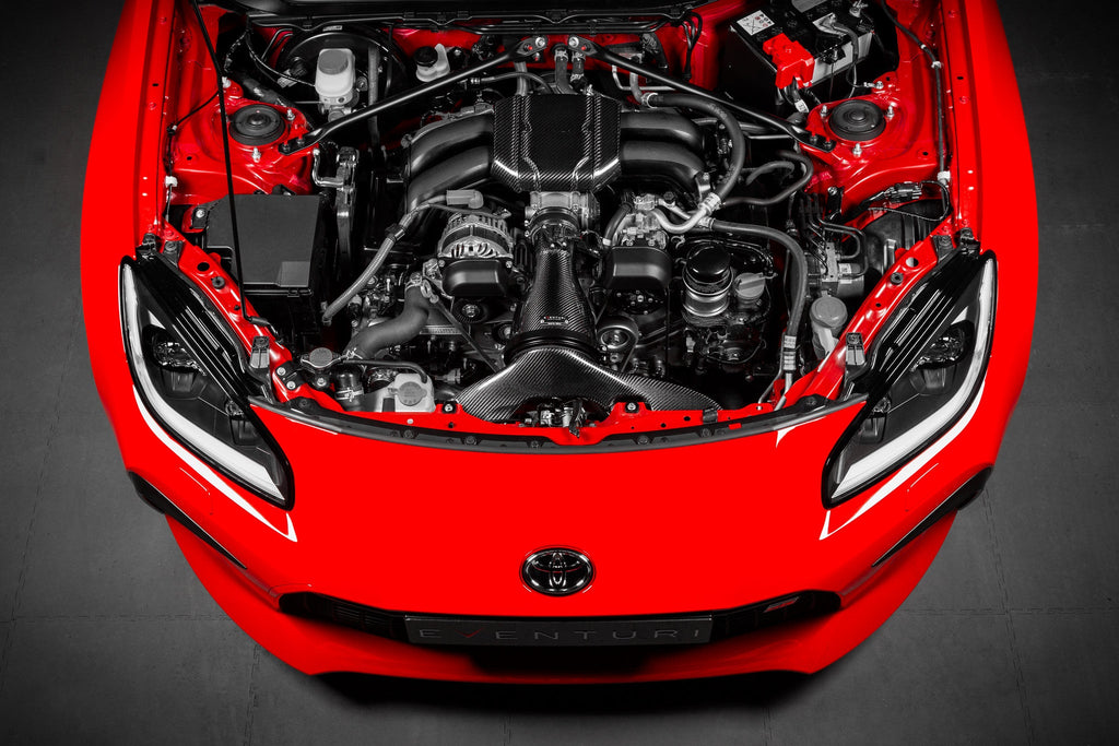 Eventuri black carbon intake system installed on a Toyota GR86, showcasing its performance-oriented design and sleek finish.