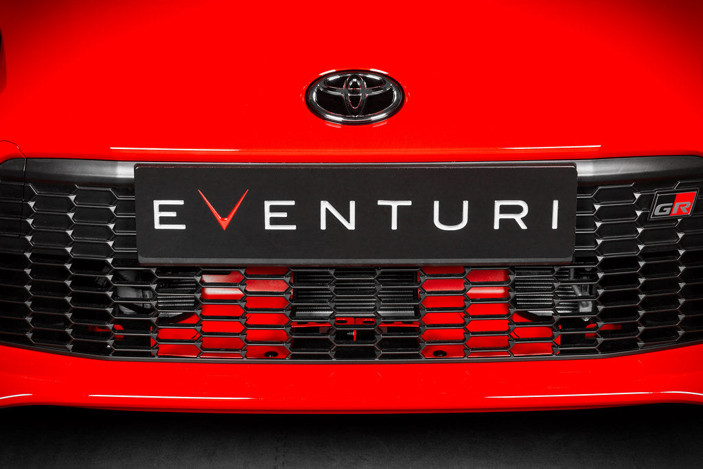 Eventuri Toyota GR86 black carbon fiber intake system with performance scoops installed, enhancing engine airflow and style.