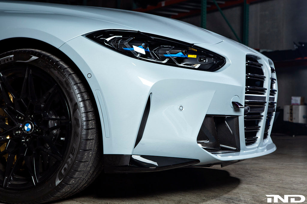 BMW G80 M3 with IND painted front reflector installed showing OEM factory paint match and finish