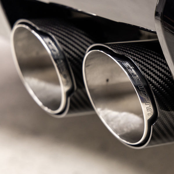 Eisenmann carbon exhaust tips on a BMW G87 M2