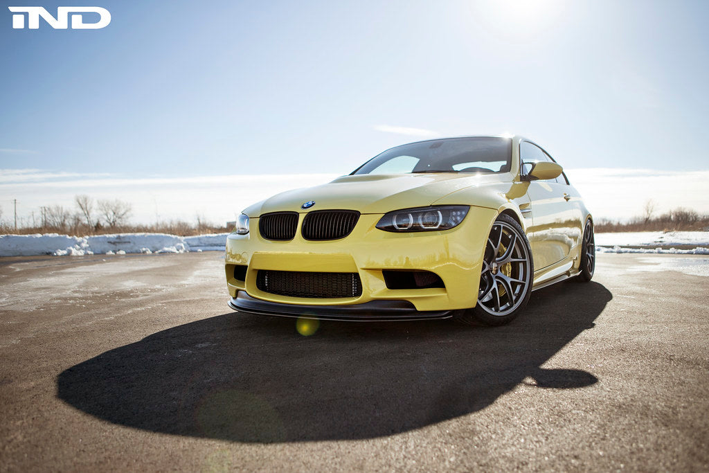 Front view of the IND E9X M3 exterior gloss black grille set installed on the vehicle.