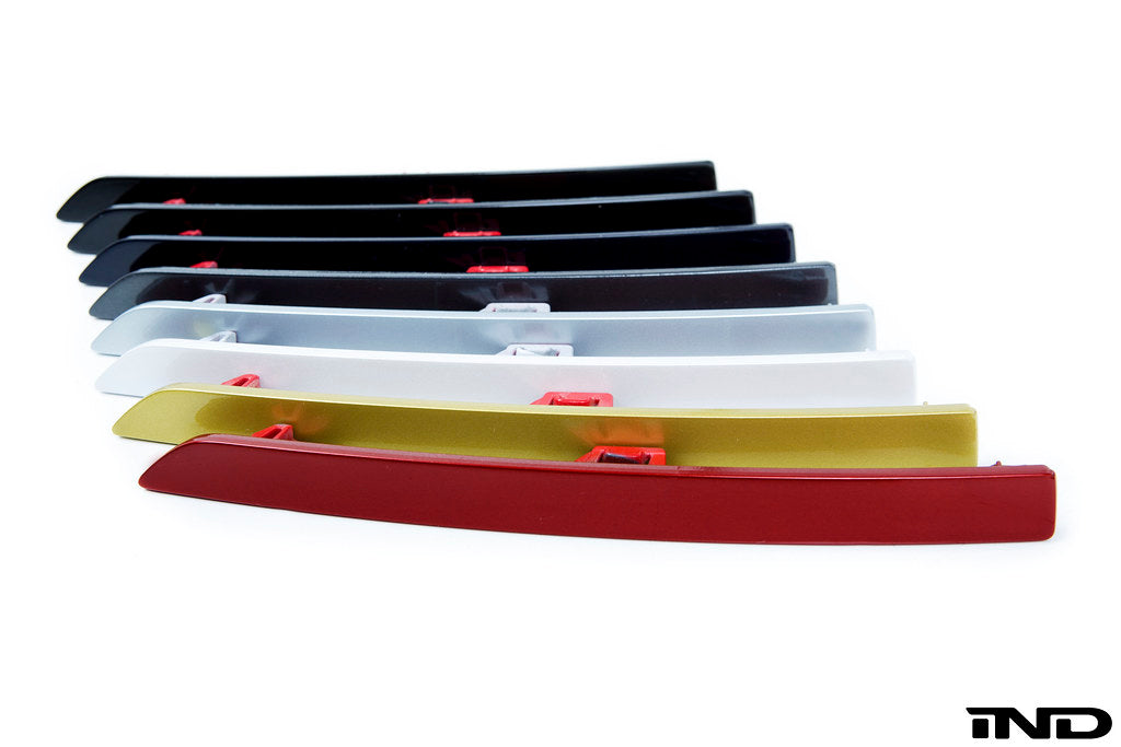 IND Painted Rear Reflector Set for the BMW F80 M3 and F82/F83 M4 on a white background, featuring brand-new genuine BMW reflector assemblies professionally painted in-house using OEM BMW paint codes for a seamless OEM-plus appearance.