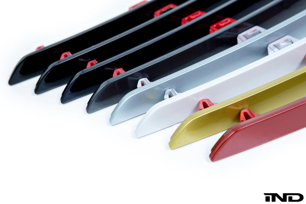 IND Painted Rear Reflector Set for the BMW F80 M3 and F82/F83 M4 on a white background, featuring brand-new genuine BMW reflector assemblies professionally painted in-house using OEM BMW paint codes for a seamless OEM-plus appearance.