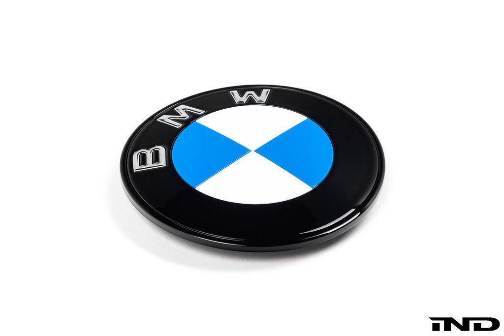 IND gloss black BMW iX3 NA5 Next Dark roundel set front and rear emblems on white background